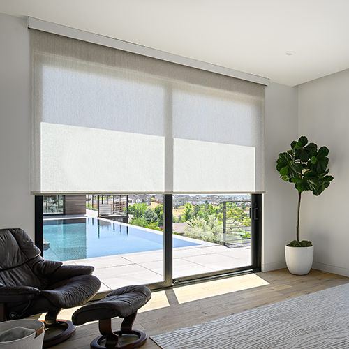 Manual and Cordless Roller Shades in a room