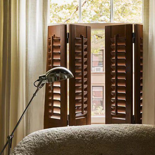 Heritance Hardwood Shutters in a room